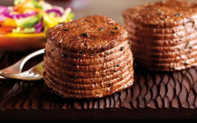 Pepper-Ancho Rubbed Ribeye Filets with Mango Slaw